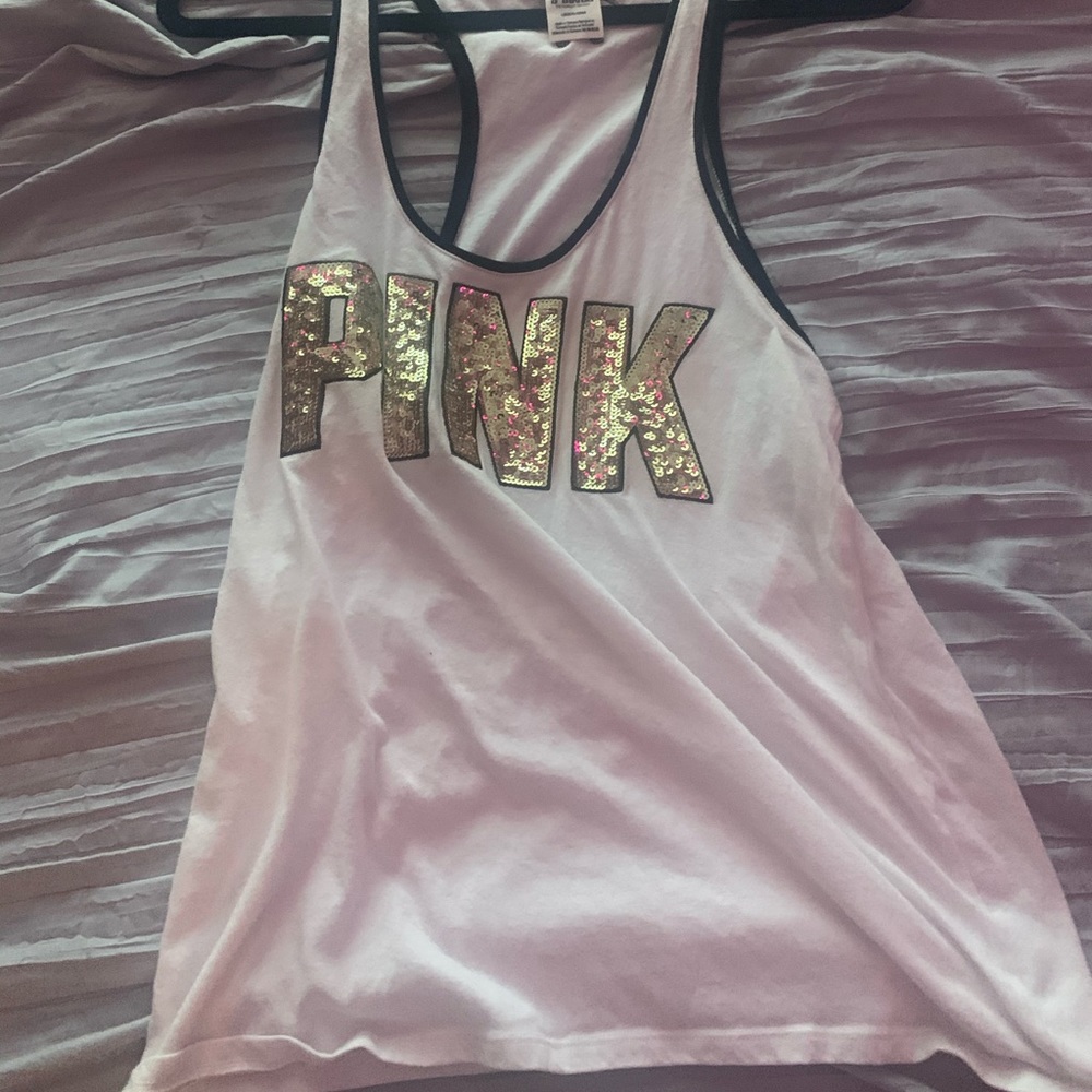A white sparkly tank top